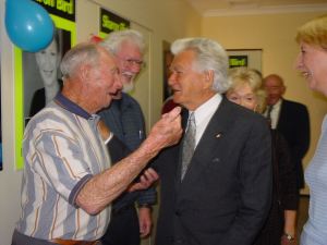 Thirroul Labor Party branch life member Keith Woodward meeting former Prime Minister Bob Hawke. Mr Hawke is coming back to Bulli on Saturday to help celebrate Thirroul branch centenary. PHOTO: Alison Byrnes.