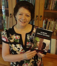 Susan Boyer with her book, Across Great Divides: True Life Stories at Sydney Cove.