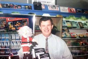Graham Sturgiss behind the counter of his Woonona Newsagency in the 1990s.