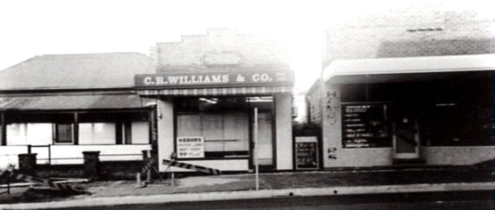The Bulli butcher shop when John Williams operated it. The dwellings to the left was the original home of the Floyd family. The house was demolished to make way for the current butcher shop in the corner of Park Road and the Princes Highway. The old butcher shop is still in existence.